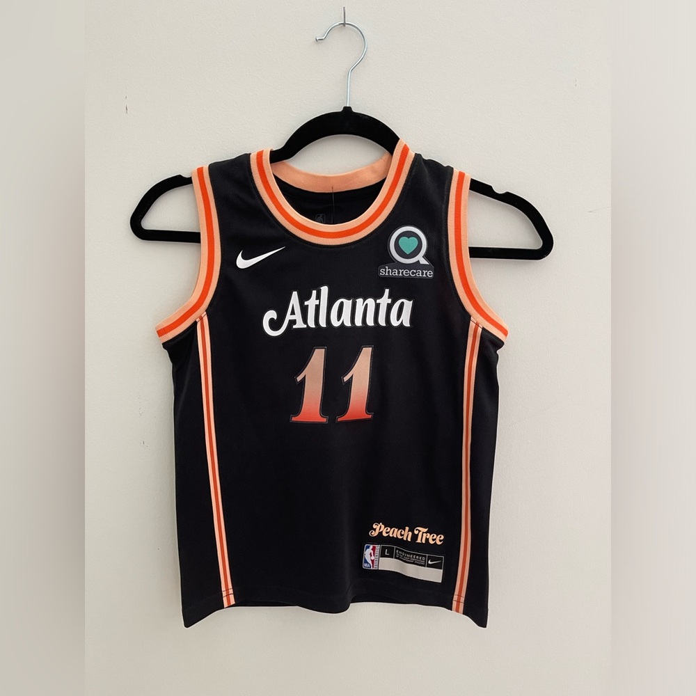 Nike youth Large Atlanta jersey—YOUNG